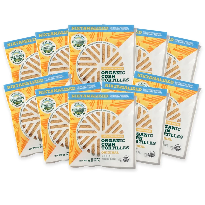 Ten packs of Original 6-inch organic corn tortillas arranged in an overlapping fan