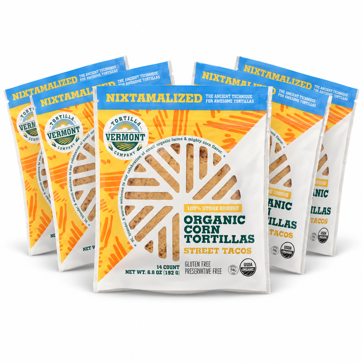 Five 14-count packs of Vermont Tortilla Company 4-inch Street Taco tortillas arranged in a fan