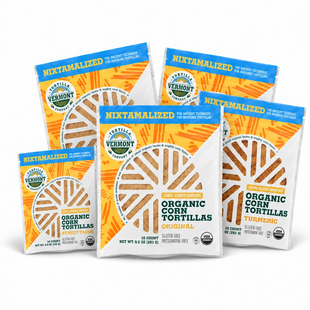 Three Original, one smaller Street Taco, and one Turmeric pack of Vermont Tortilla Company corn tortillas