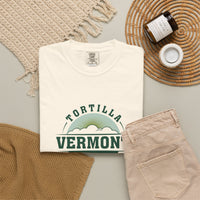 Ivory Classic Emblem T-shirt, folded shirt styled with casual clothing and accessories