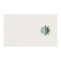 Classic Emblem white cotton twill tortilla towel laid flat, showing the green-and-sage Vermont Tortilla Company emblem