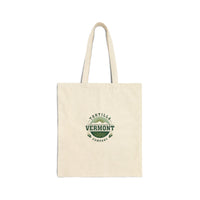 Classic Emblem natural canvas tote, front view with the small emblem centered on the bag