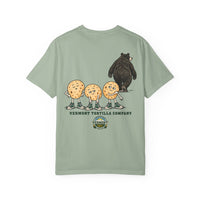 Bay Feel the Squish T-shirt, back with three tortilla characters, a departing bear, and the Vermont Tortilla Company name and emblem