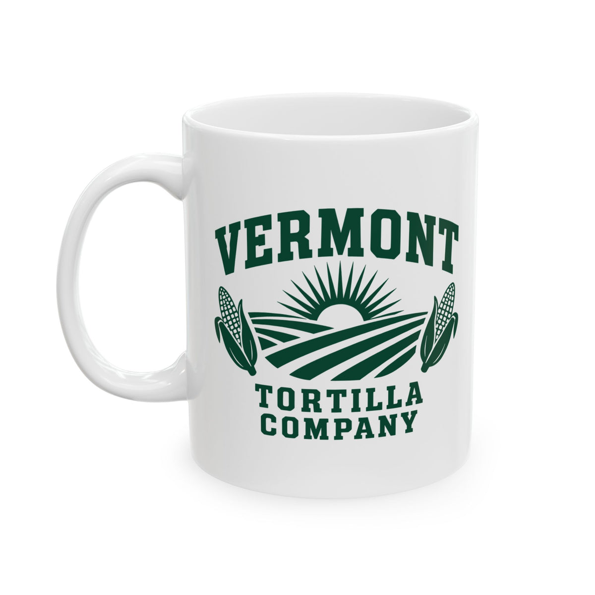 11 oz white ceramic mug with forest-green Vermont Tortilla Company lettering, a rising sun, fields, and two ears of corn, design view