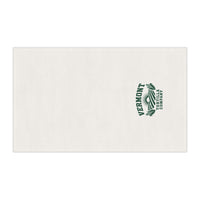 Fields & Sun white cotton twill tortilla towel laid flat, showing the forest-green Vermont Tortilla Company design