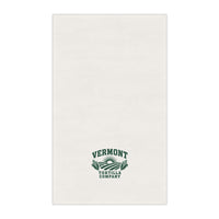 Fields & Sun white cotton twill tortilla towel, front view with forest-green Vermont Tortilla Company lettering, sun, fields, and corn toward the lower end