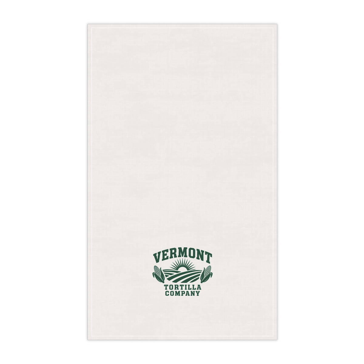 Fields & Sun white cotton twill tortilla towel, front view with forest-green Vermont Tortilla Company lettering, sun, fields, and corn toward the lower end