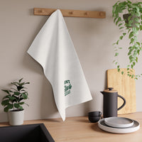 Fields & Sun white cotton twill tortilla towel with the forest-green design in a kitchen setting