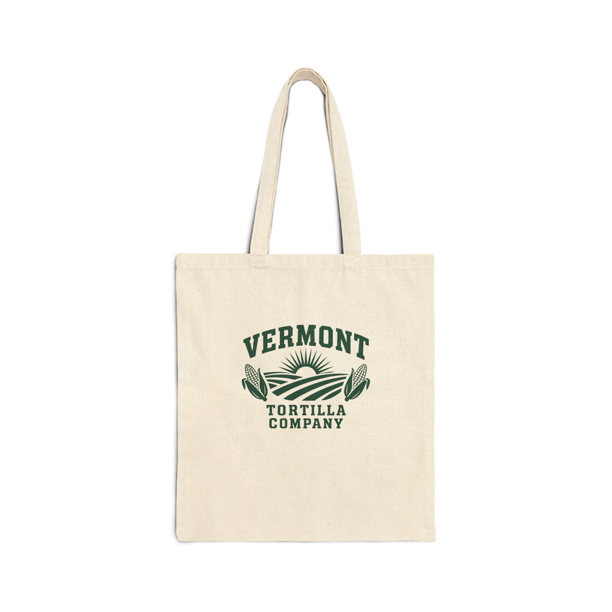 Fields & Sun natural cotton canvas tote with Vermont Tortilla Company lettering, fields, a rising sun, and two corn ears in forest green, front view