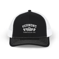 Black / White Fields & Sun Richardson 112 trucker hat, front view showing white VERMONT lettering, sunrise, fields, corn, and TORTILLA CO. embroidery