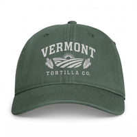 Moss Fields & Sun Comfort Colors washed-cotton cap with white VERMONT lettering, rising sun, farm fields, two ears of corn, and TORTILLA CO. embroidered on the front, front view