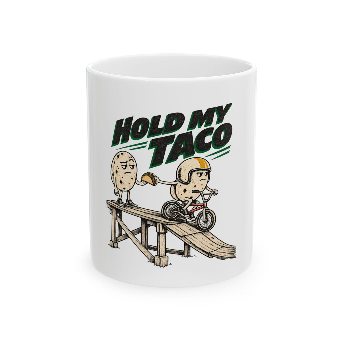 11 oz white ceramic Hold My Taco mug with two illustrated tortilla characters at a bicycle ramp and bold lettering with green accents, design view