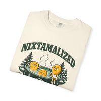 Ivory Nixtamalized in Vermont T-shirt, folded close-up of the Nixtamalized in Vermont lettering and corn-kernel artwork