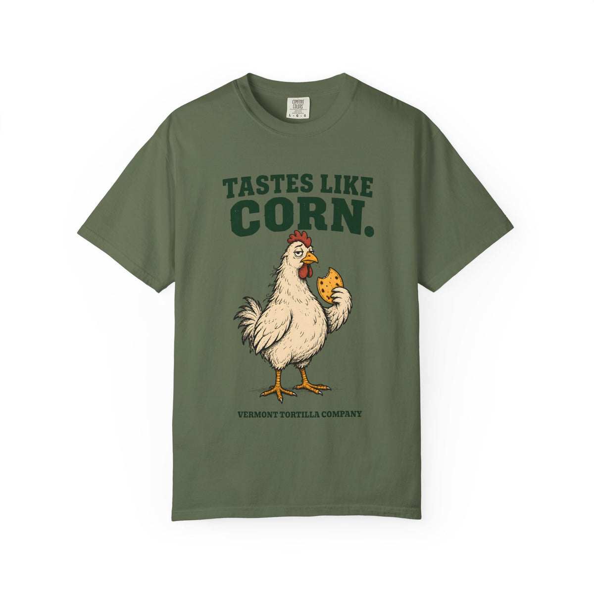 Sage Tastes Like Corn T-shirt, front with Tastes Like Corn lettering, a chicken holding a tortilla, and the Vermont Tortilla Company name
