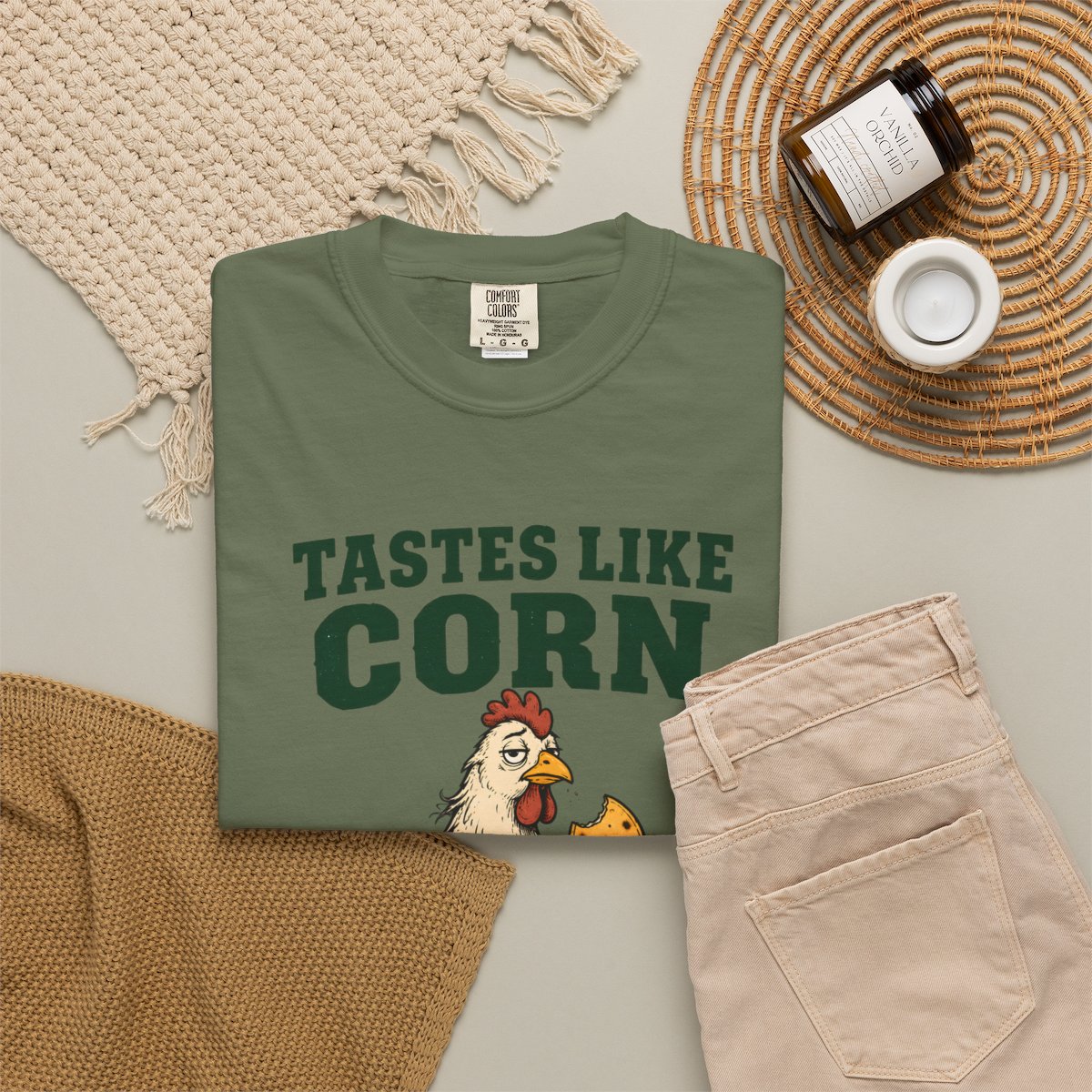 Sage Tastes Like Corn T-shirt, folded shirt styled with casual clothing and accessories